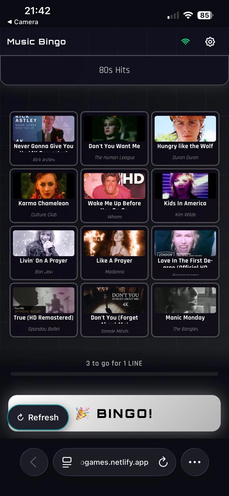 A player's phone showing their unique Music Bingo card of twelve songs from the 80s Hits playlist
