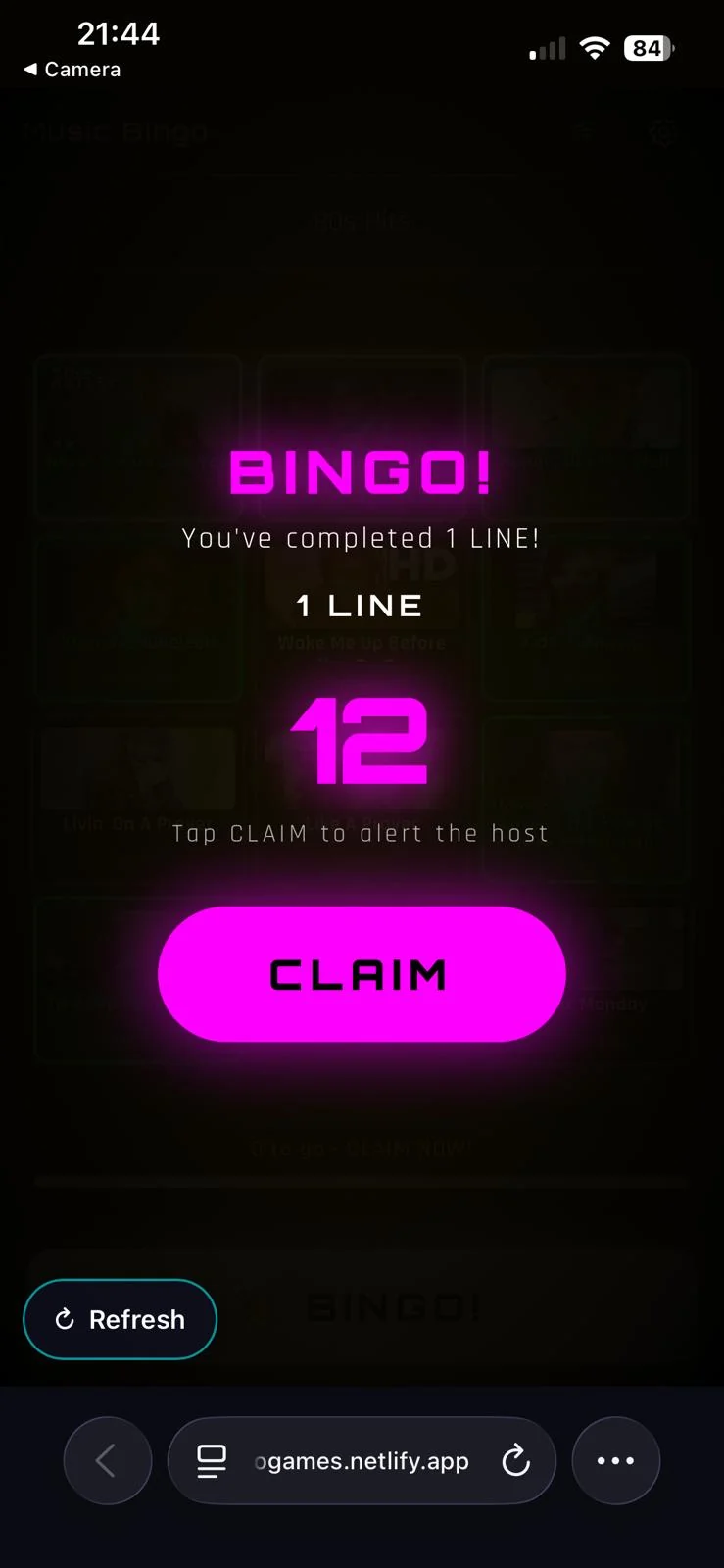 A player's phone showing BINGO with a completed line of twelve songs and a claim button to alert the host